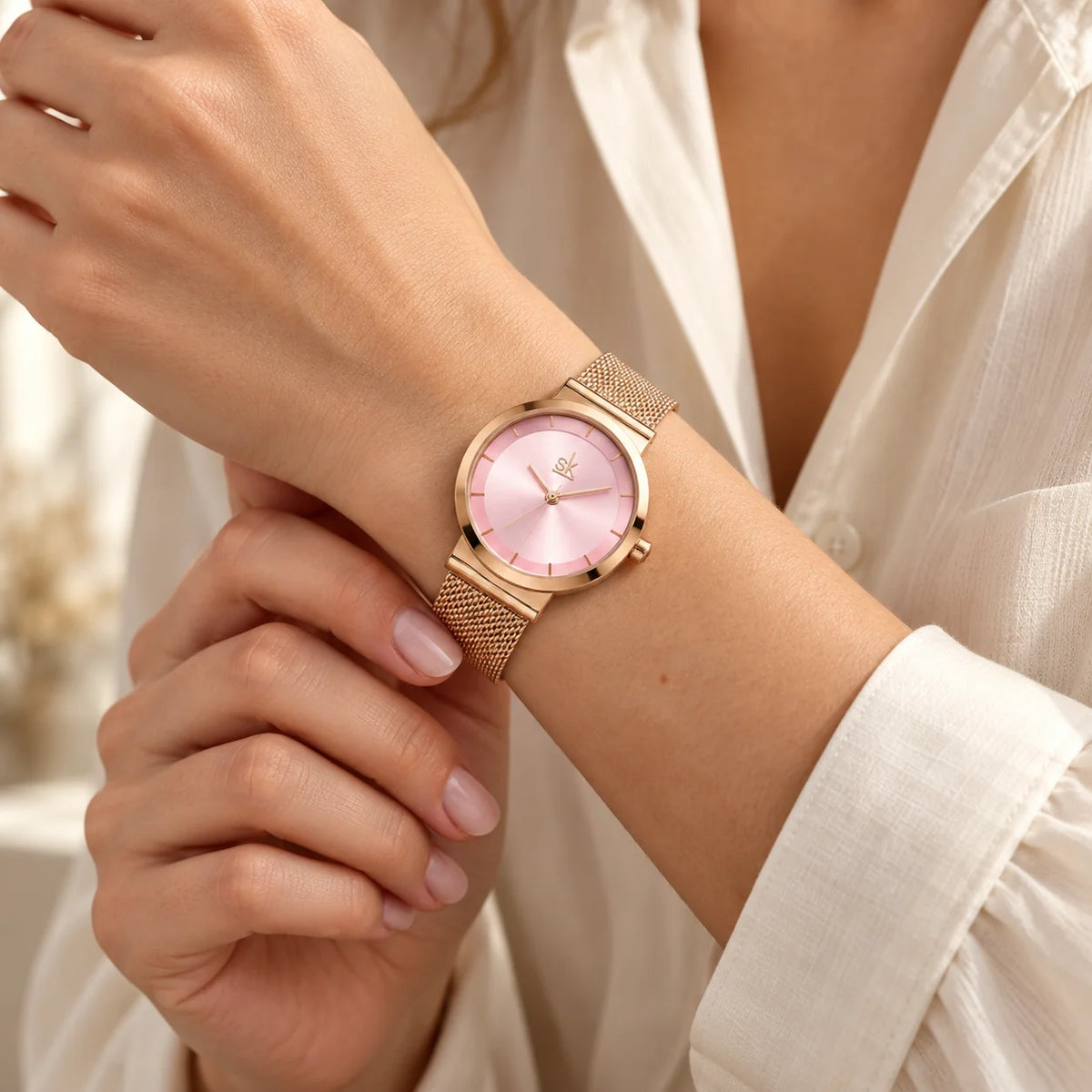 Rose gold Milanese watch, rose sunray dial